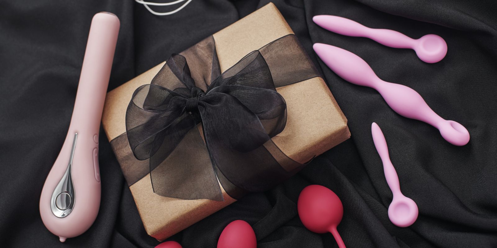 Doc Johnson Tryst vibrator in purple, dual-arm ergonomic sex toy for clitoral, G-spot, nipple, and testicular stimulation.